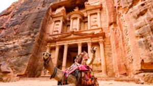 Petra, known as Raqmu to its inhabitants, is a historic city in southern Jordan famous for its rock-cut architecture and water systems.